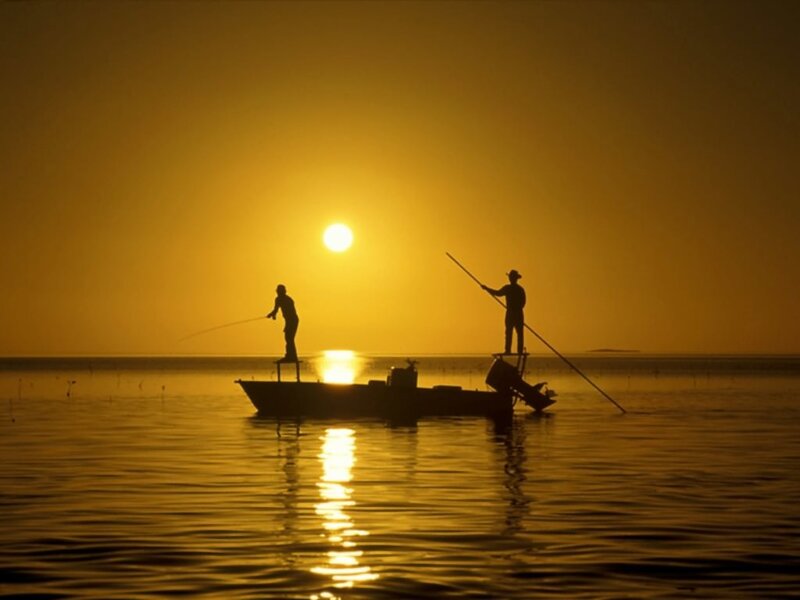 Two Fishermen on a Boat