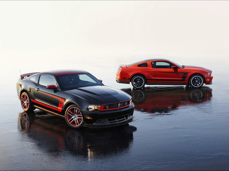 Two Ford Mustang Cars — Black