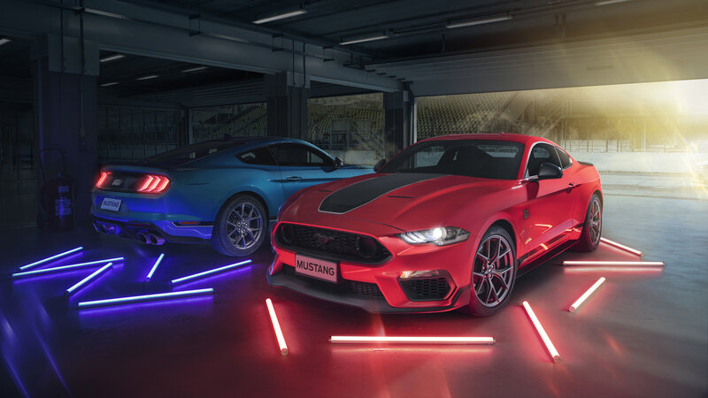 Two Ford Mustang Cars — Red, Dramatic