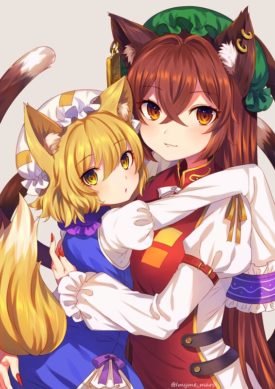 Two Fox-eared Girls Hugging