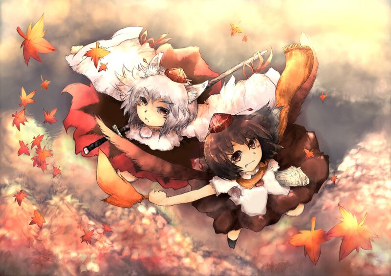 Two fox girls in autumn leaves