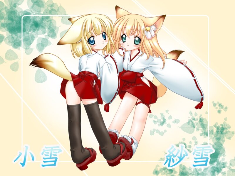 Two fox girls in traditional attire