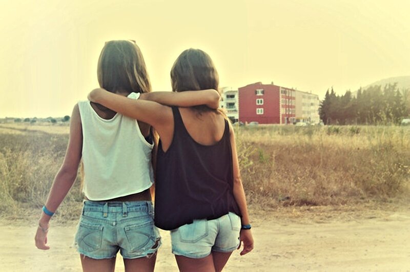 two friends walking together