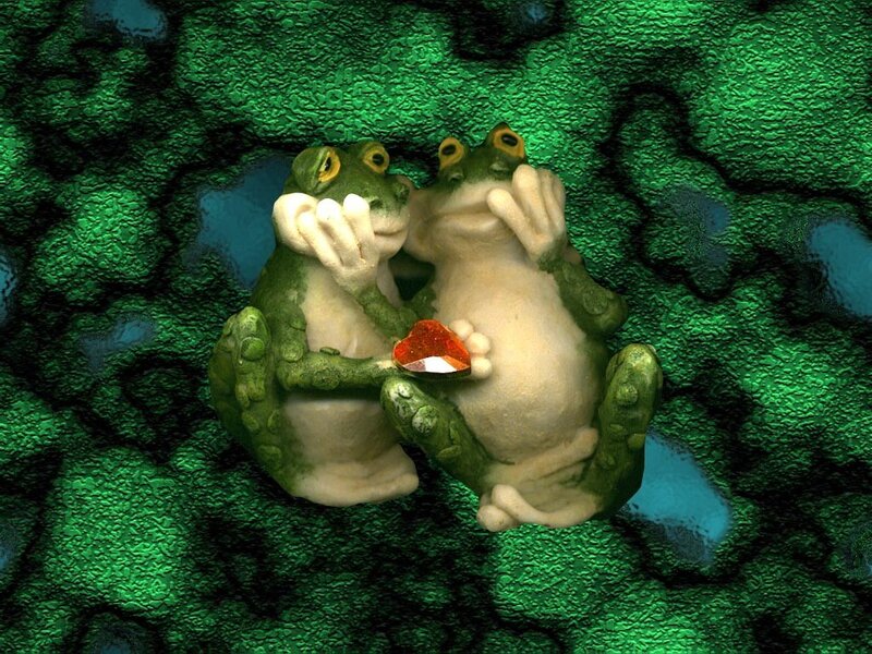 Two frogs holding a heart