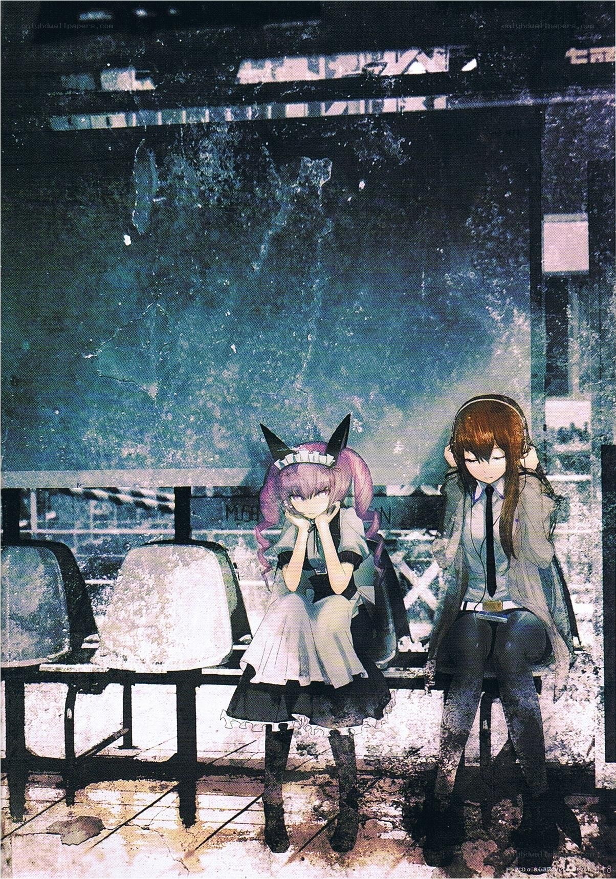 Two girls at a bus stop