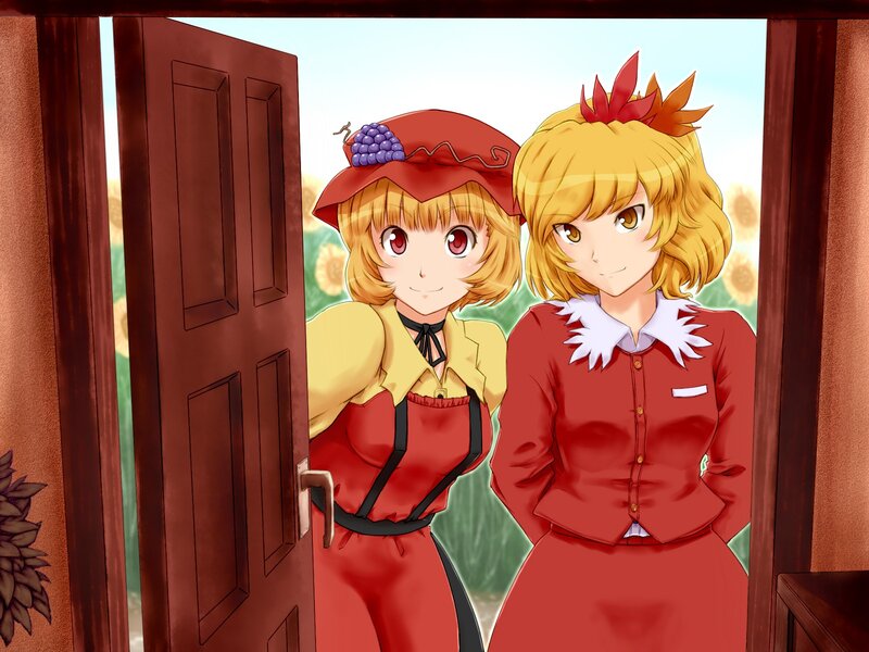 two girls at a doorway