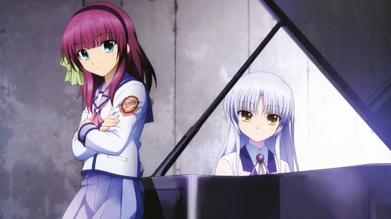 Two girls at a piano