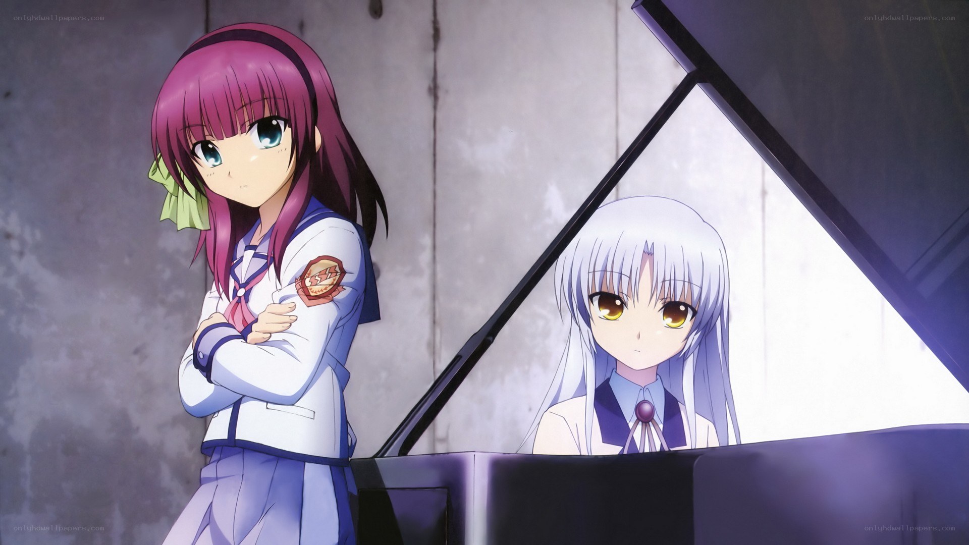 Two girls at a piano