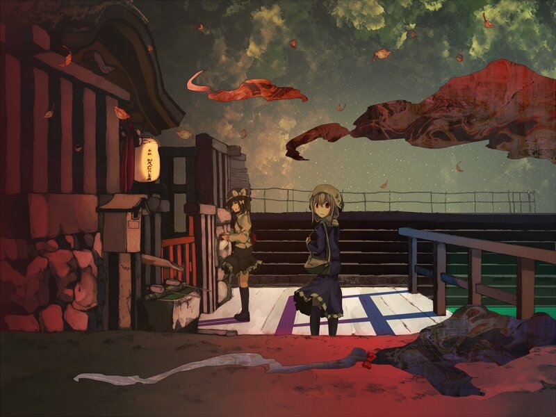 Two girls at a shrine at dusk