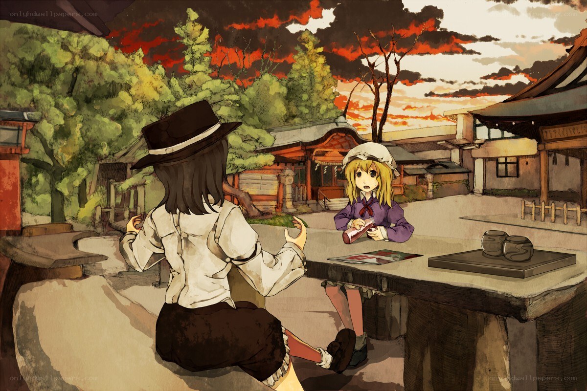 Two girls at a shrine table