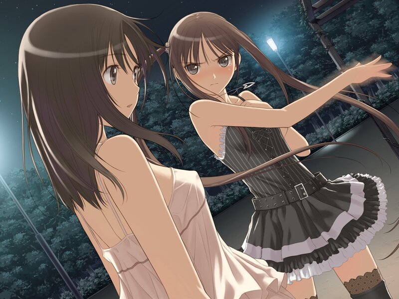 Two girls at night in a park