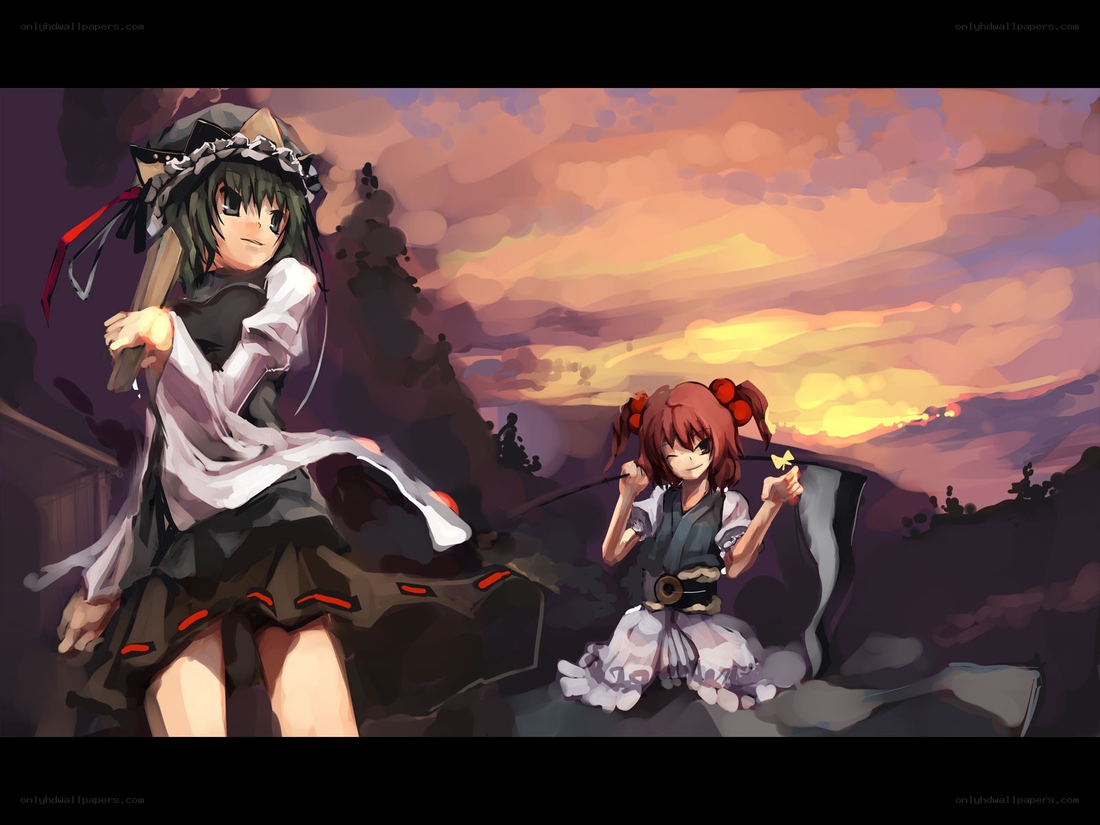 Two girls at sunset