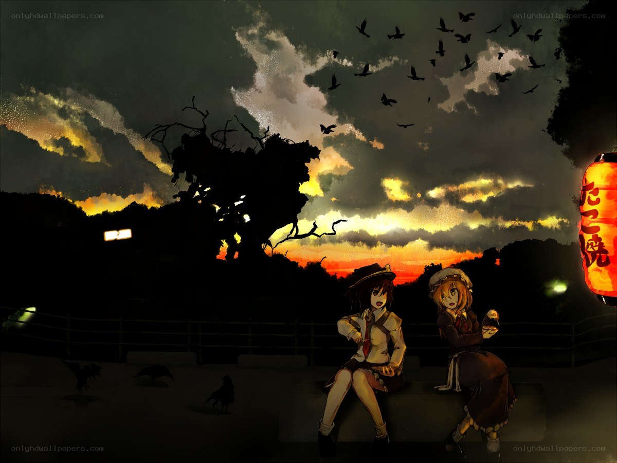Two girls at sunset with lantern