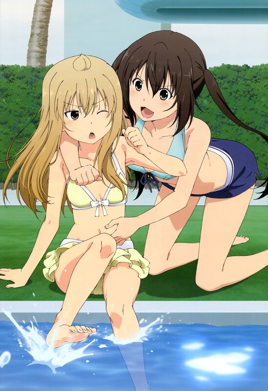 Two girls at the poolside
