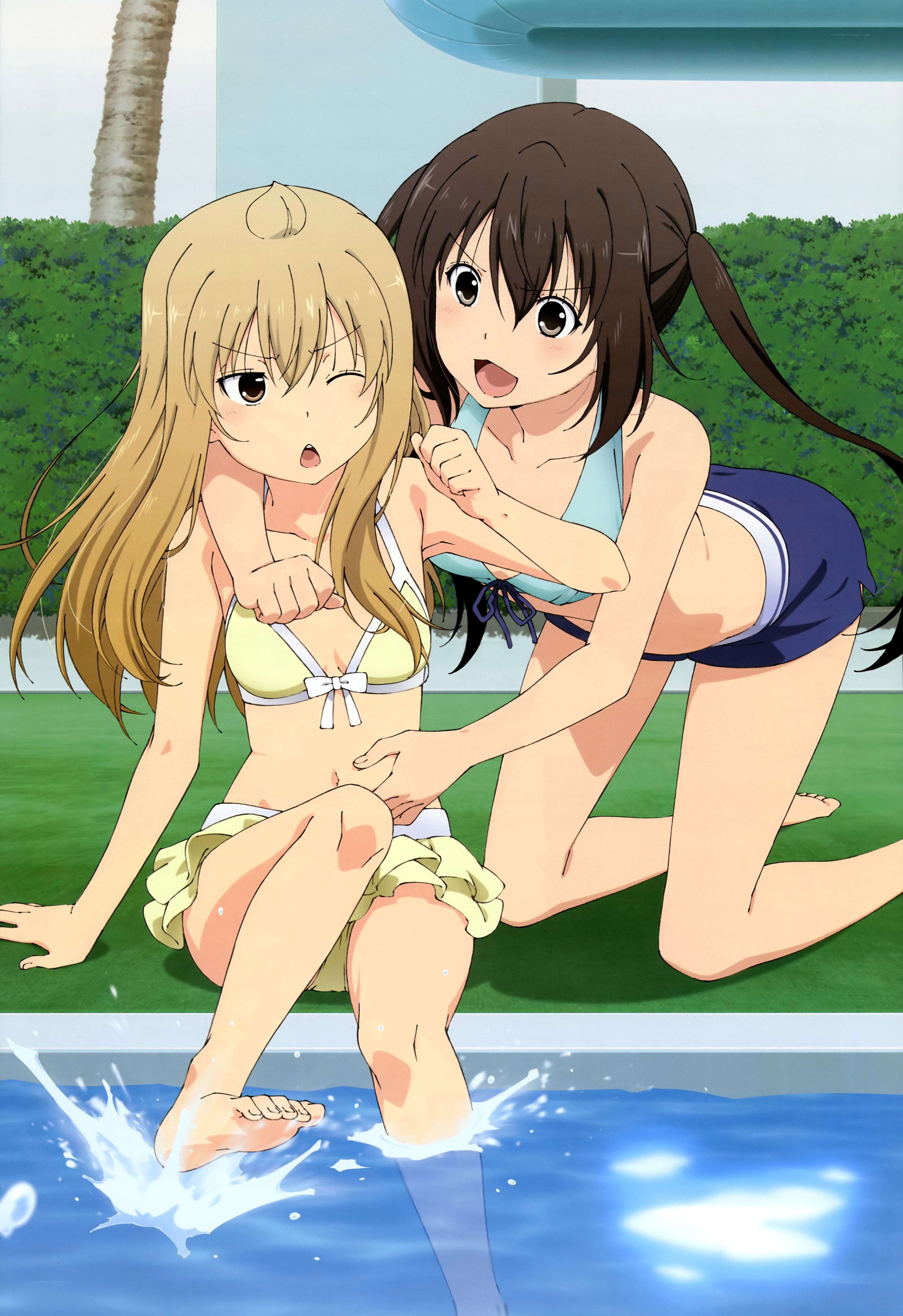 Two girls at the poolside