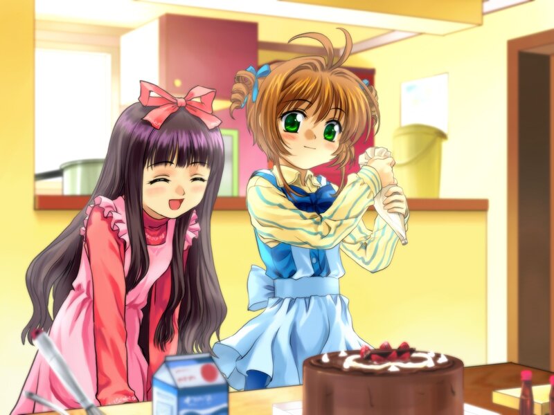 Two Girls Baking Cake