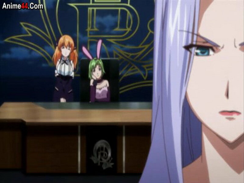 Two Girls Behind a Desk