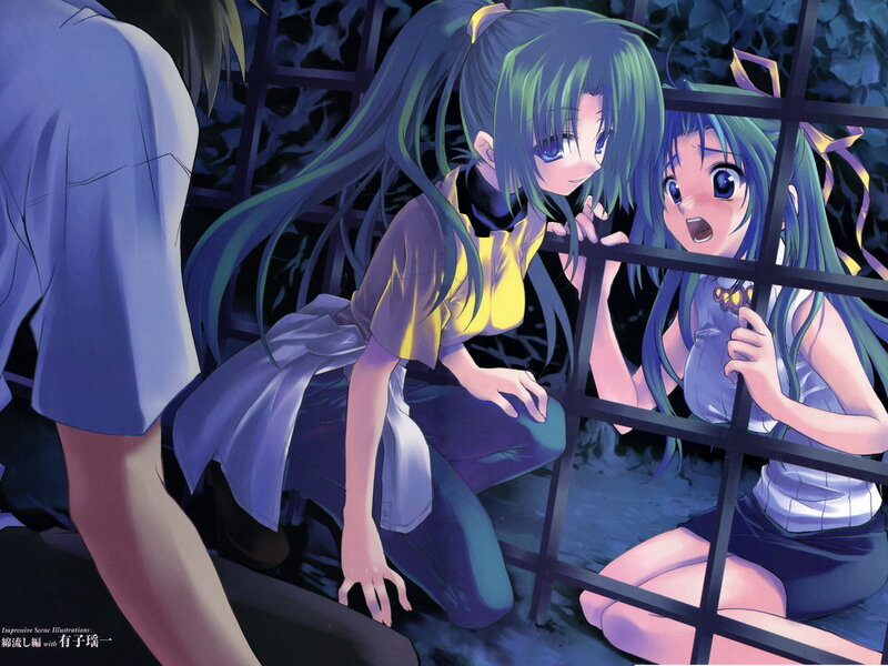 Two girls behind a gate