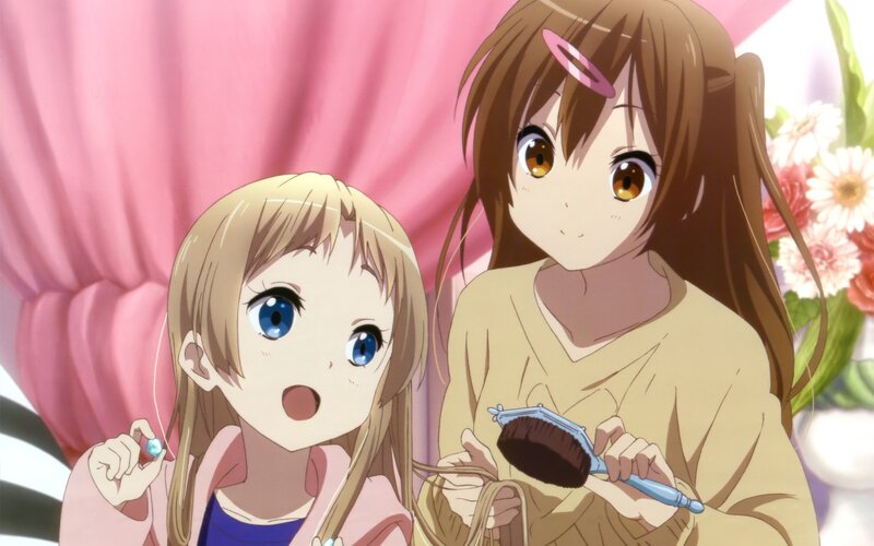 Two girls brushing hair