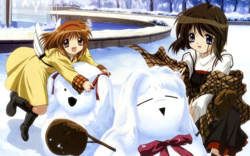 Two Girls Building Snowmen