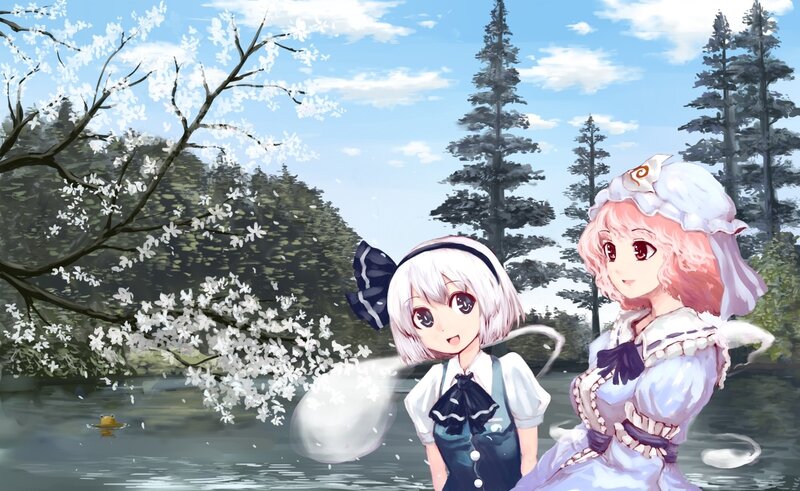 Two girls by a cherry blossom pond