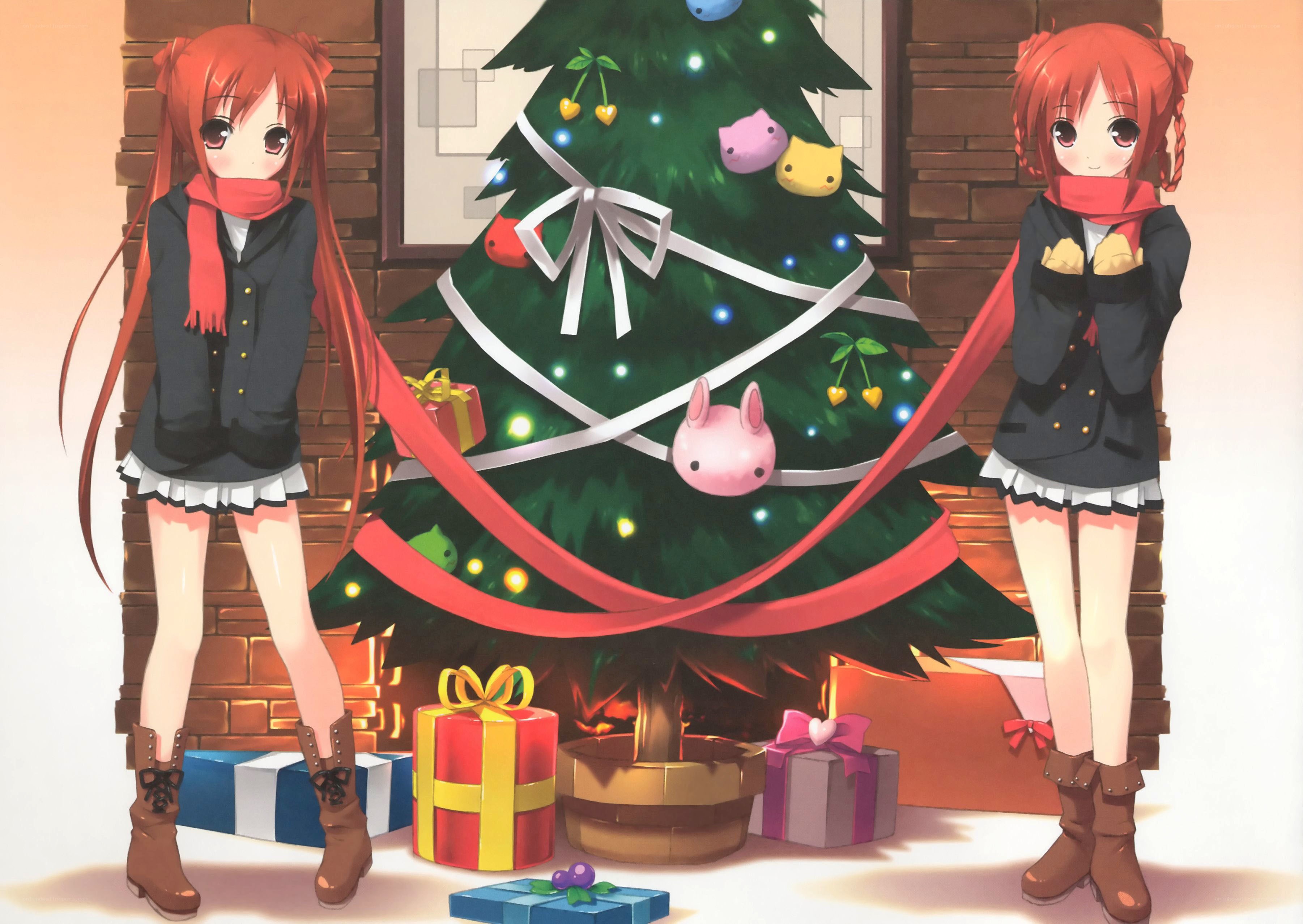 Two girls by a Christmas tree