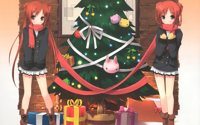 Two girls by a Christmas tree