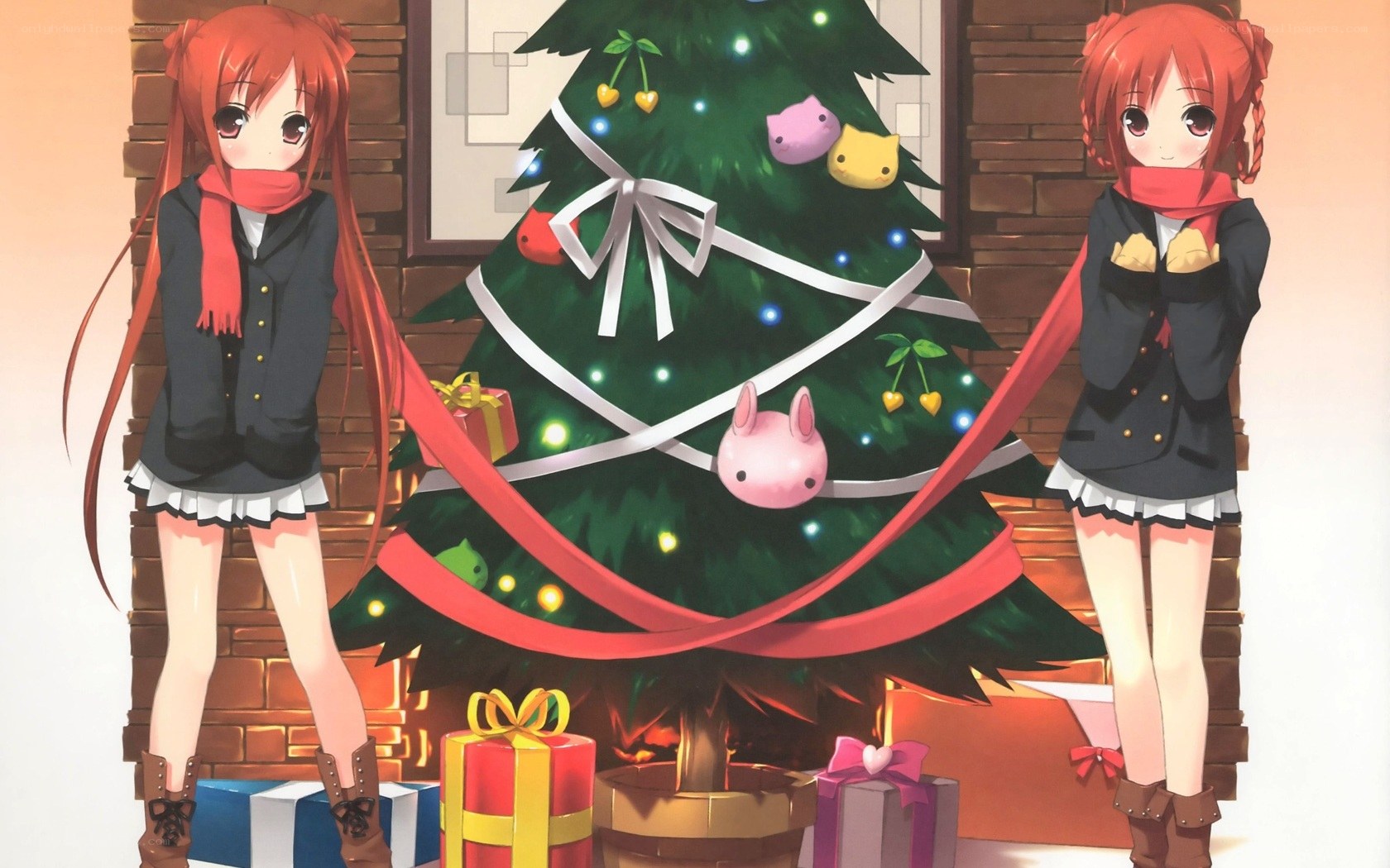 Two girls by a Christmas tree