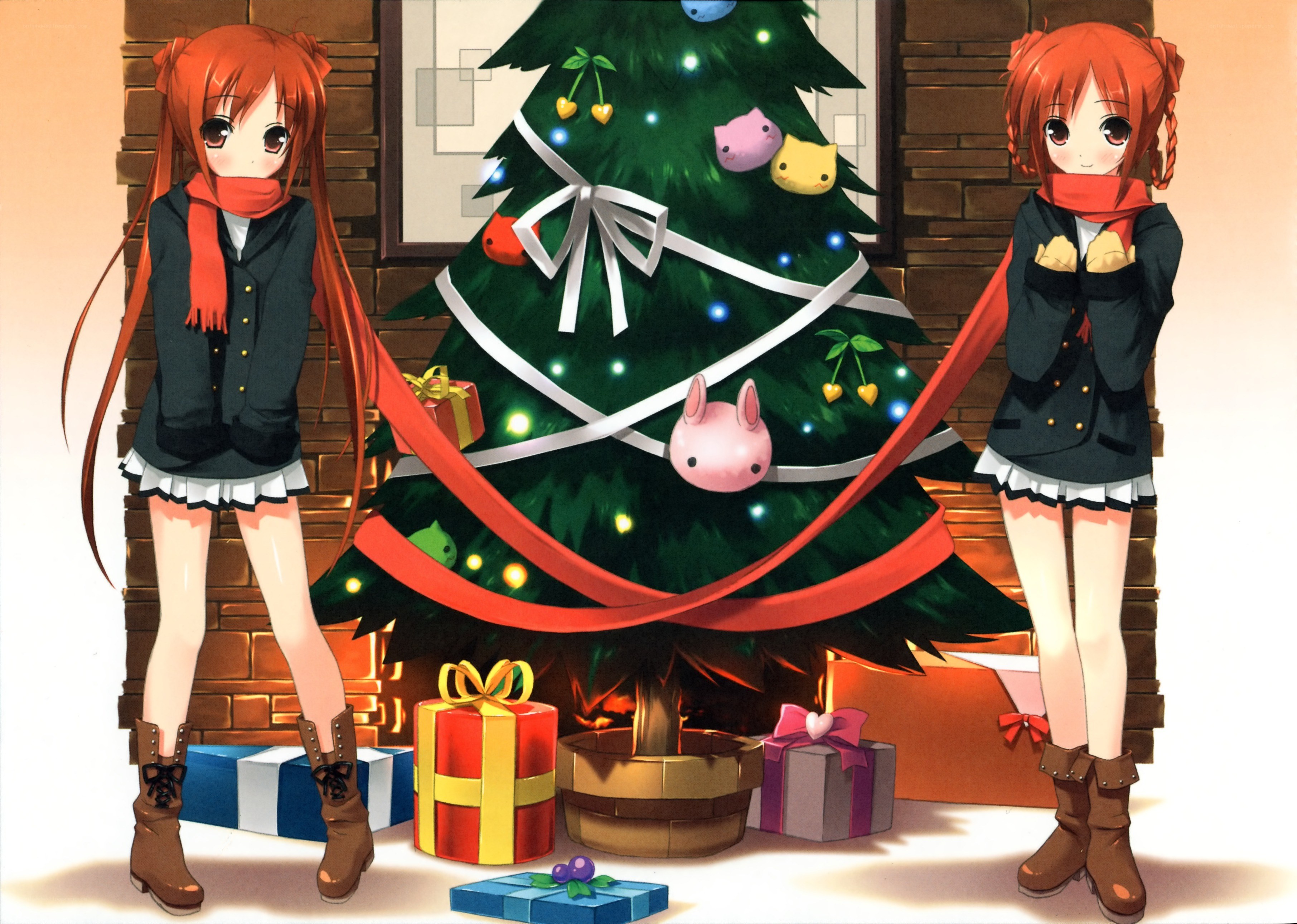 Two girls by a Christmas tree