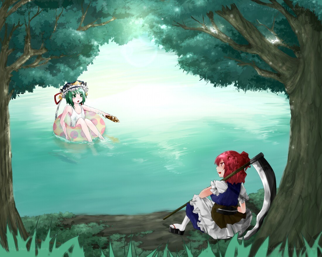 Two girls by a lake