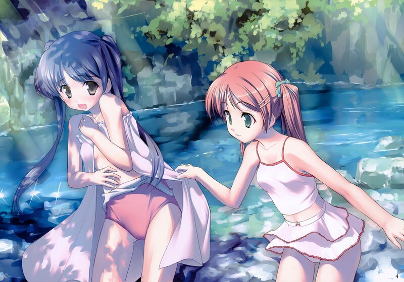 Two girls by a stream