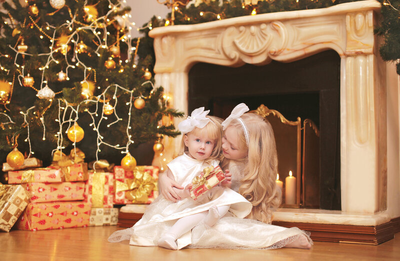 Two Girls by Fireplace