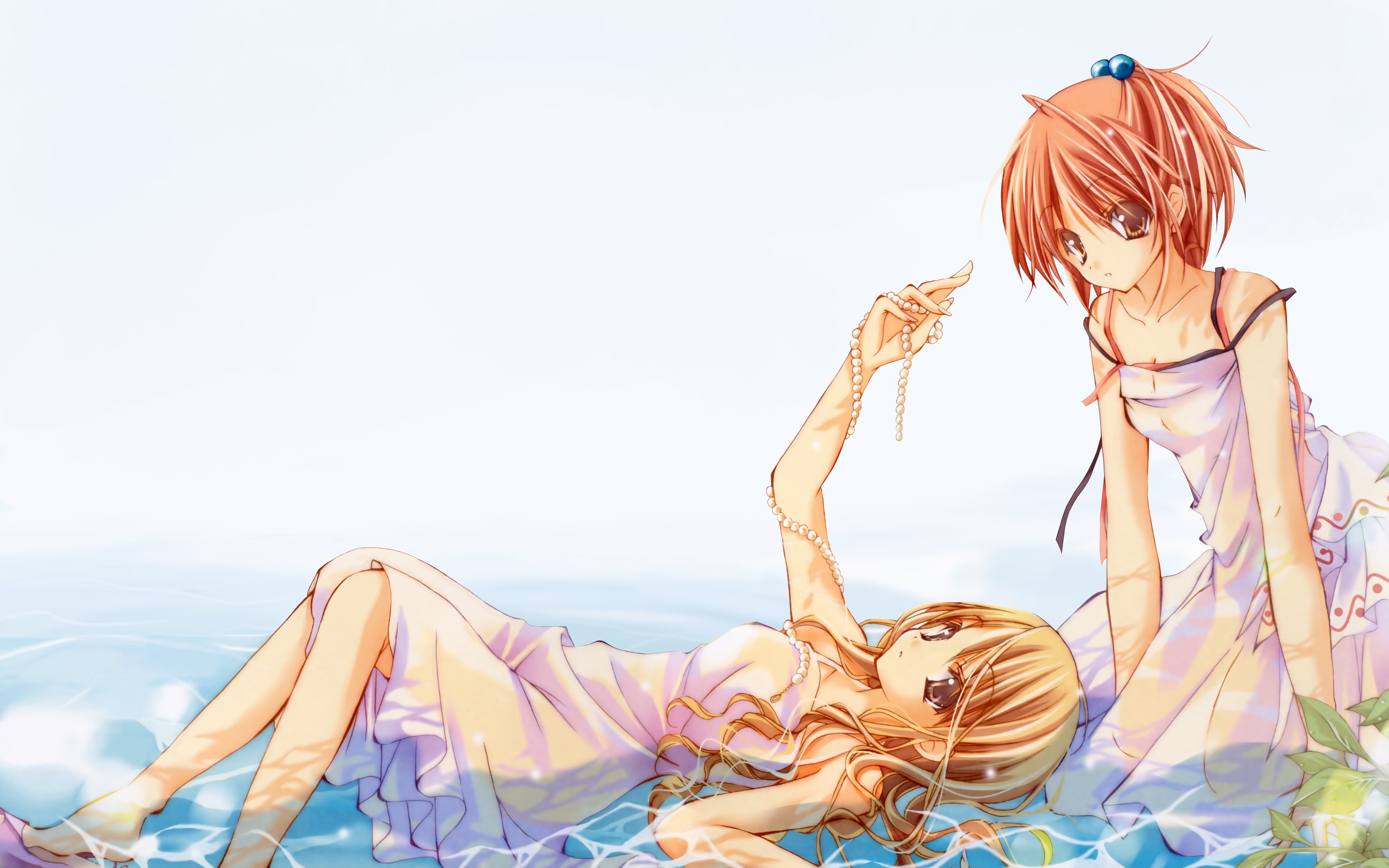 Two girls by the water