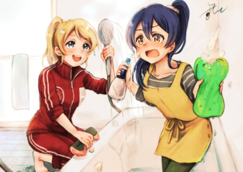 Two Girls Cleaning Bathtub