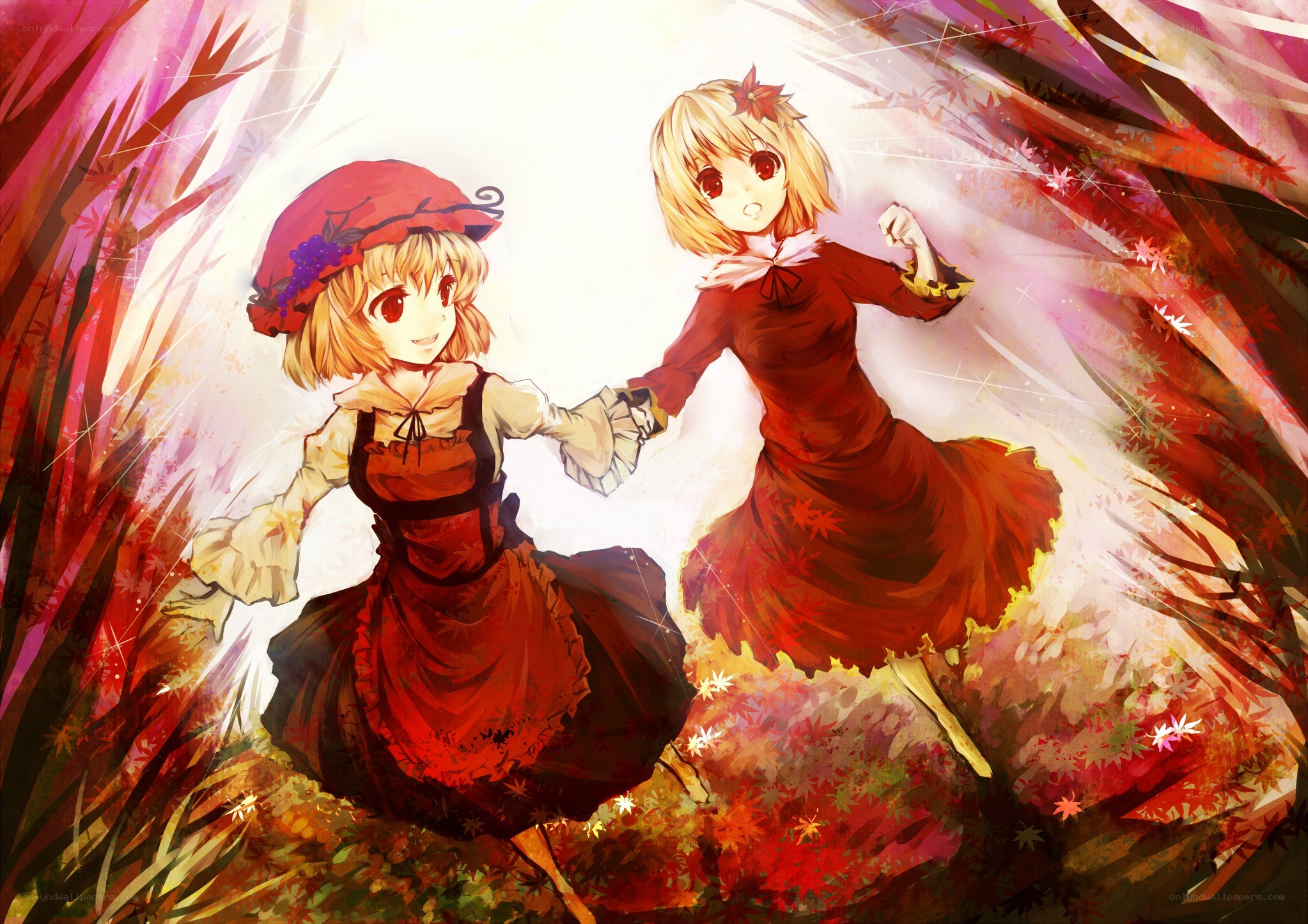 Two girls dancing in autumn