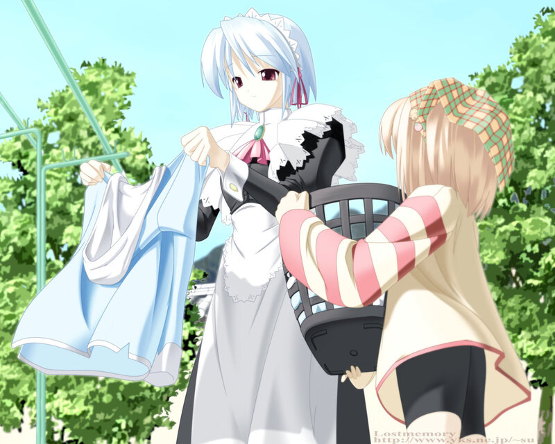 Two girls doing laundry