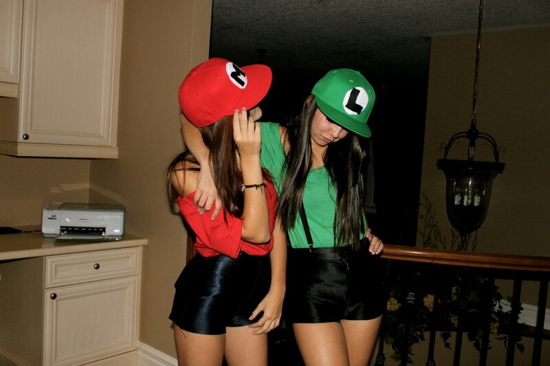 Two girls dressed as Mario and Luigi