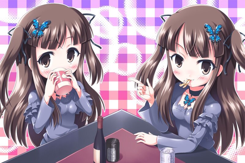 Two girls drinking at a table