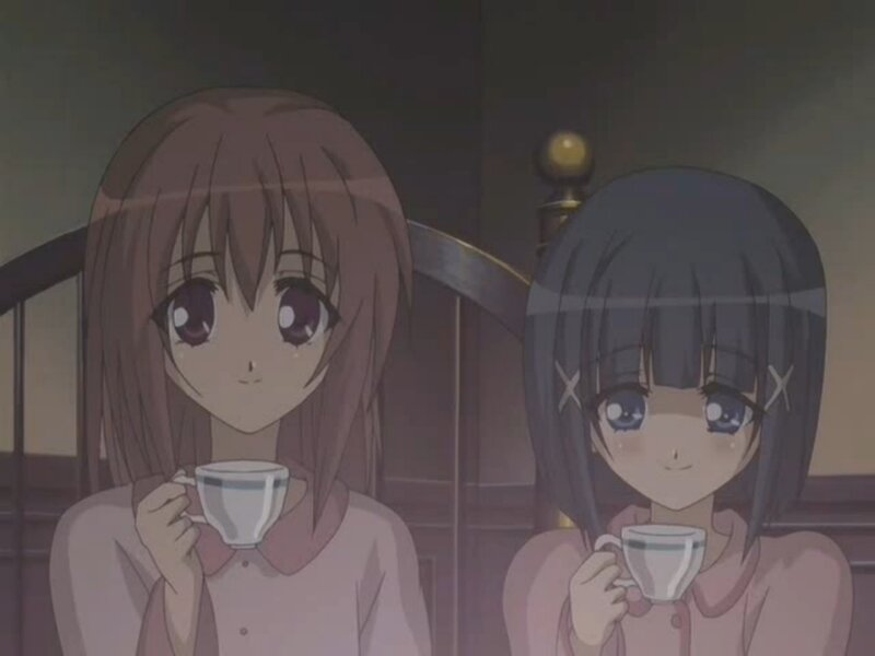 Two Girls Drinking Tea