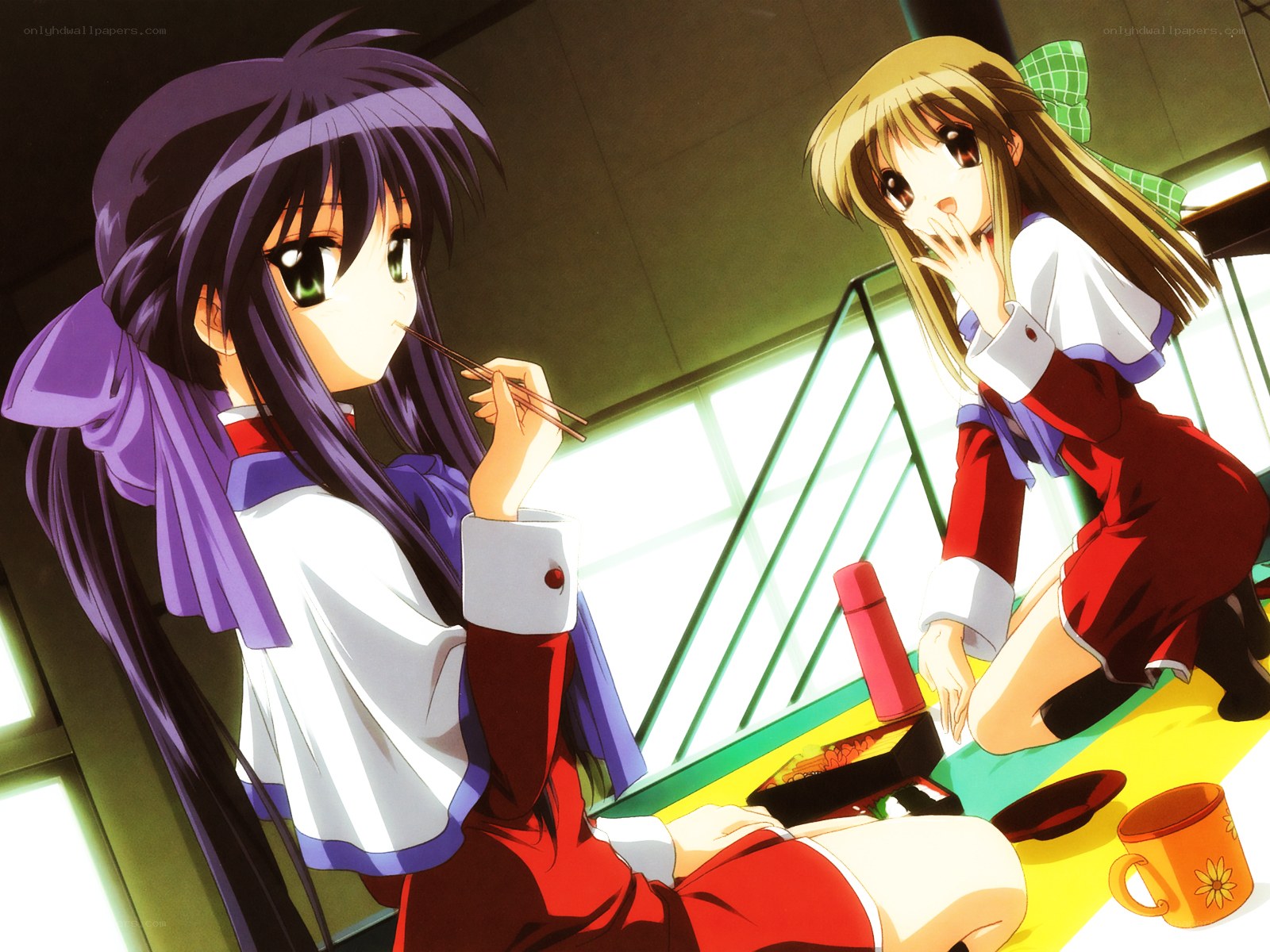 Two girls eating bento