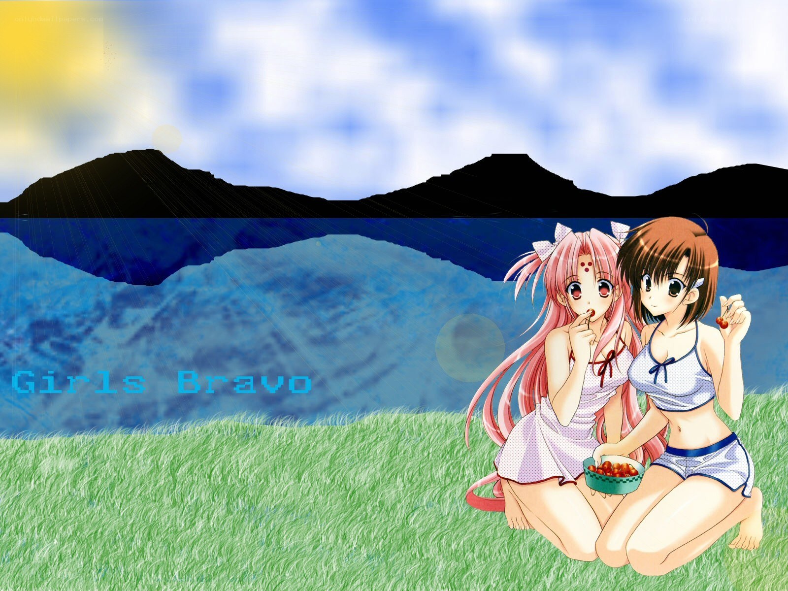 Two girls eating berries