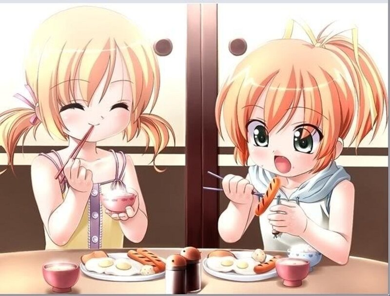 Two Girls Eating Breakfast
