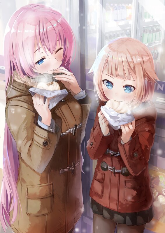 Two Girls Eating Buns