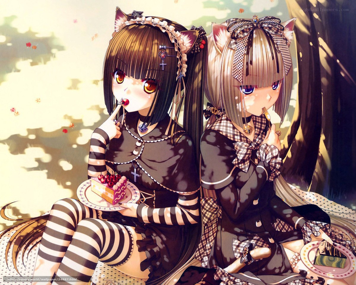Two girls eating cake