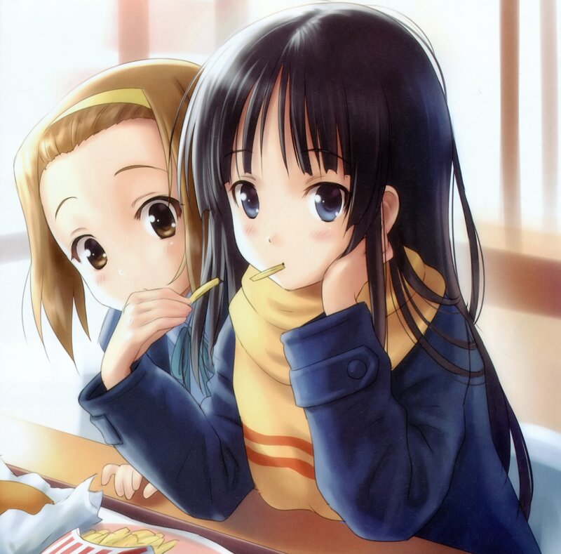 Two Girls Eating Fries