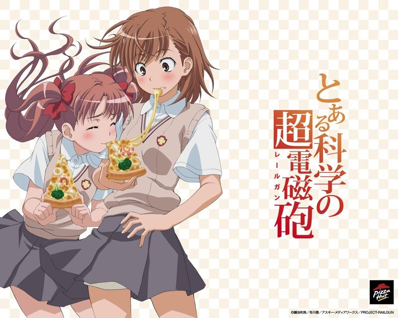 Two girls eating pizza