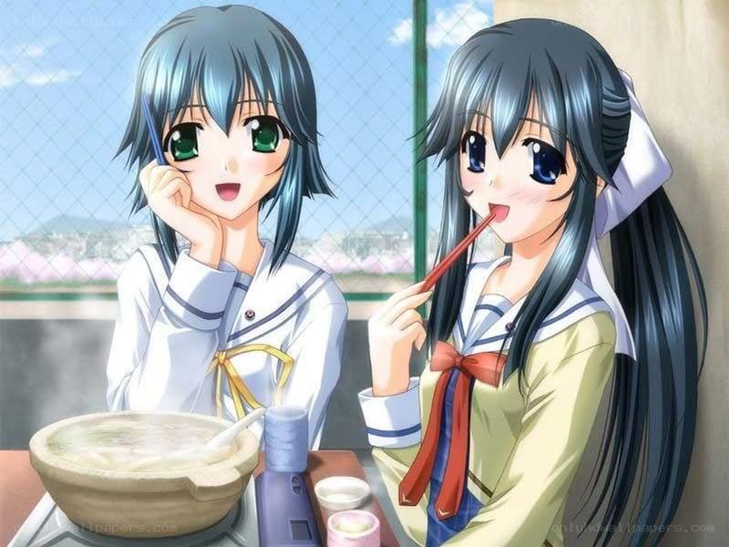 Two girls eating ramen