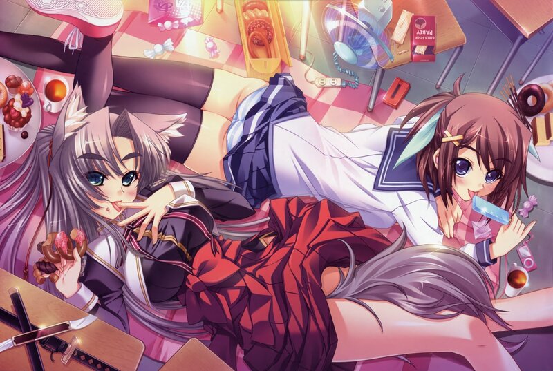 Two girls eating sweets