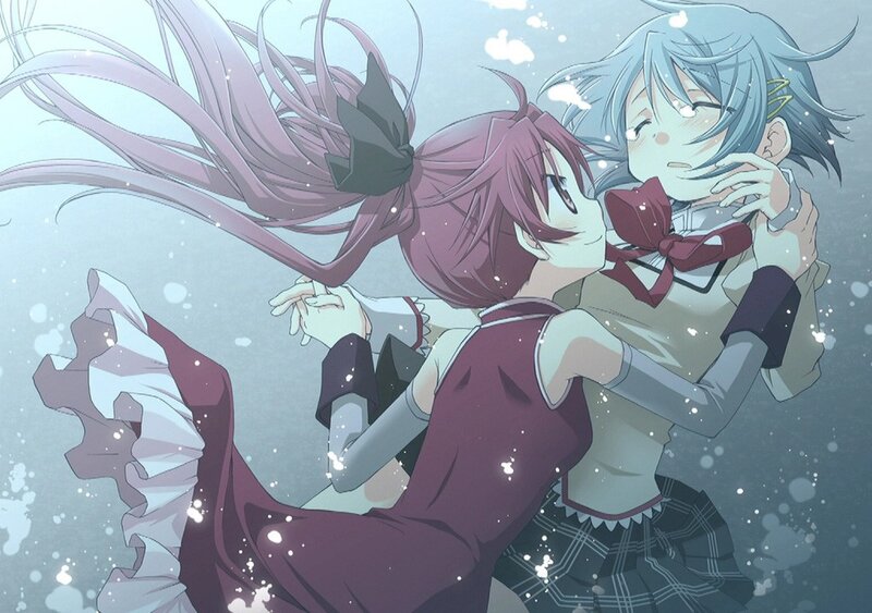 Two girls embracing in snow