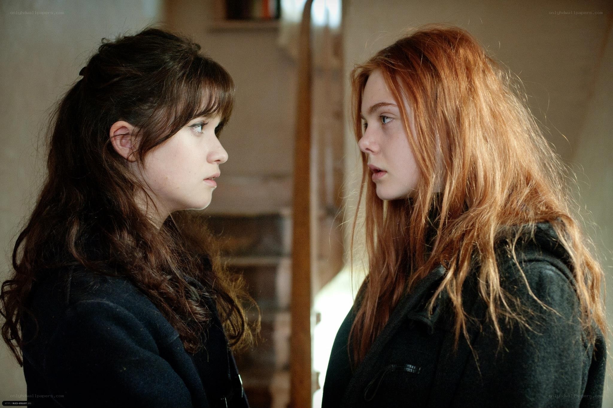 two girls facing each other